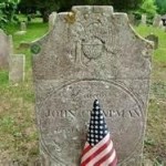 Sharp Hill stone with flag